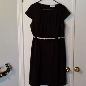 Black Calvin Klein sheath dress with silver belt